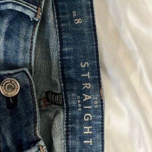 White House Black Market cropped jeans with embroidered details.